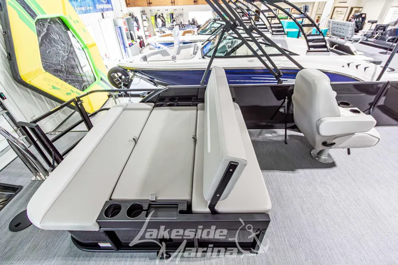 Slide: The Image of 2026 Godfrey Sweetwater 2286 SFLX pontoon boat interior with seating and cup holders. - 27