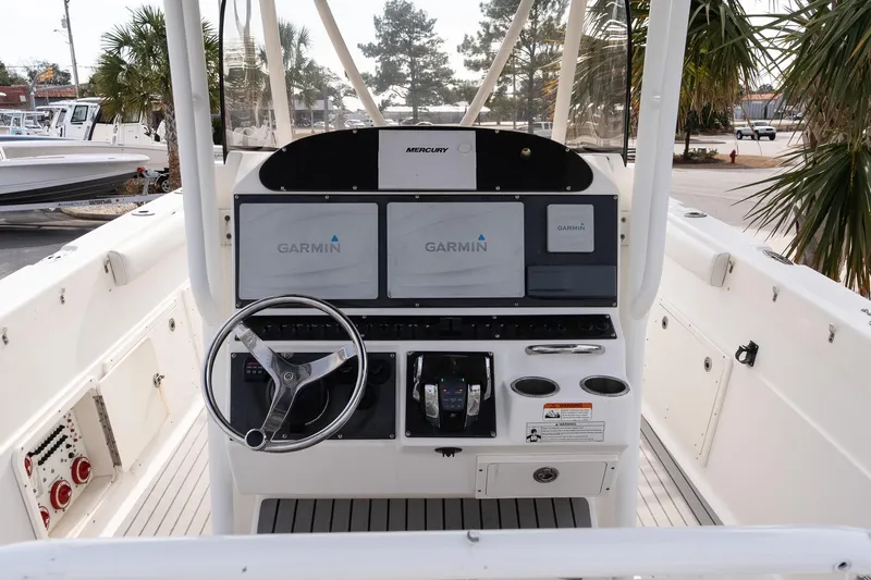 Slide: The Image of 2007 Wellcraft 35 Tournament boat interior with seating and multiple outboard engines. - 11