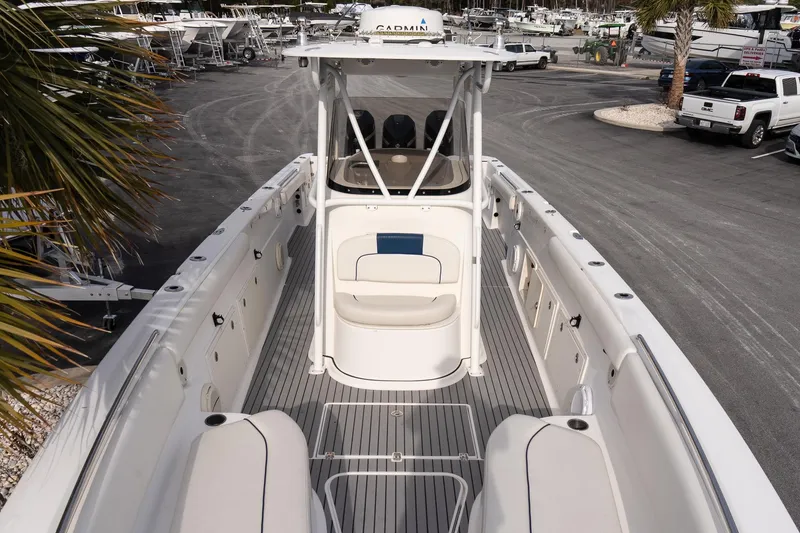 Slide: The Image of 2007 Wellcraft 35 Tournament boat interior with white seating and gray flooring. - 15