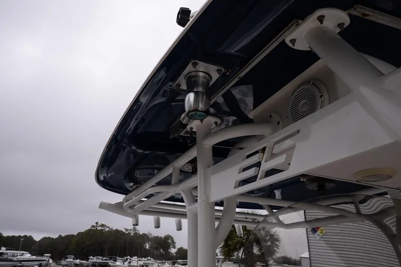 Slide: The Image of 2007 Wellcraft 35 Tournament boat detail, featuring overhead structure and speakers. - 20