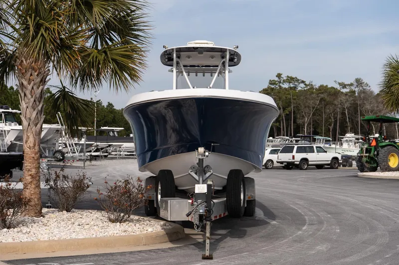 Slide: The Image of 2007 Wellcraft 35 Tournament boat on trailer in marina parking lot. - 3