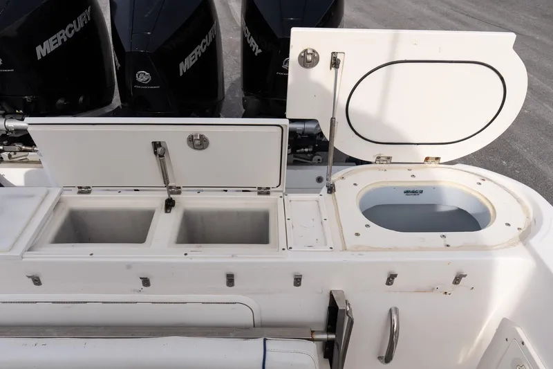 Slide: The Image of 2007 Wellcraft 35 Tournament boat cockpit with Garmin navigation system and steering wheel. - 9