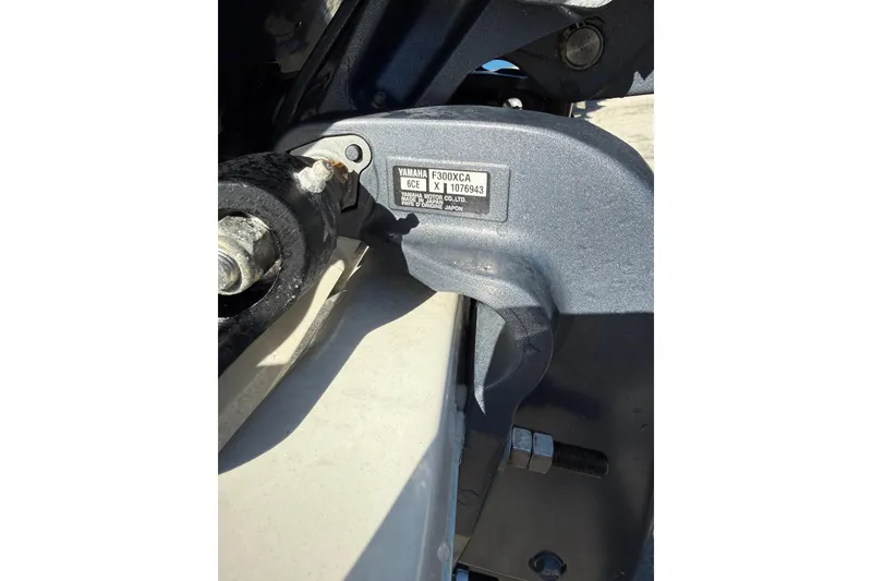 Slide: The Image of Close-up of Yamaha F300XCA engine part on 2021 Key West 239 FS boat. - 6