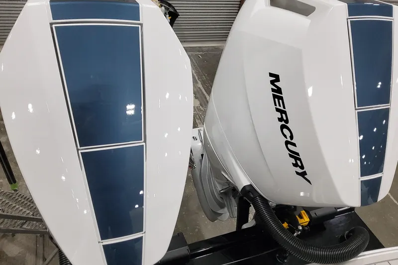 Slide: The Image of 2026 Formula 330 Crossover Bowrider OB with dual Mercury outboard engines. - 19