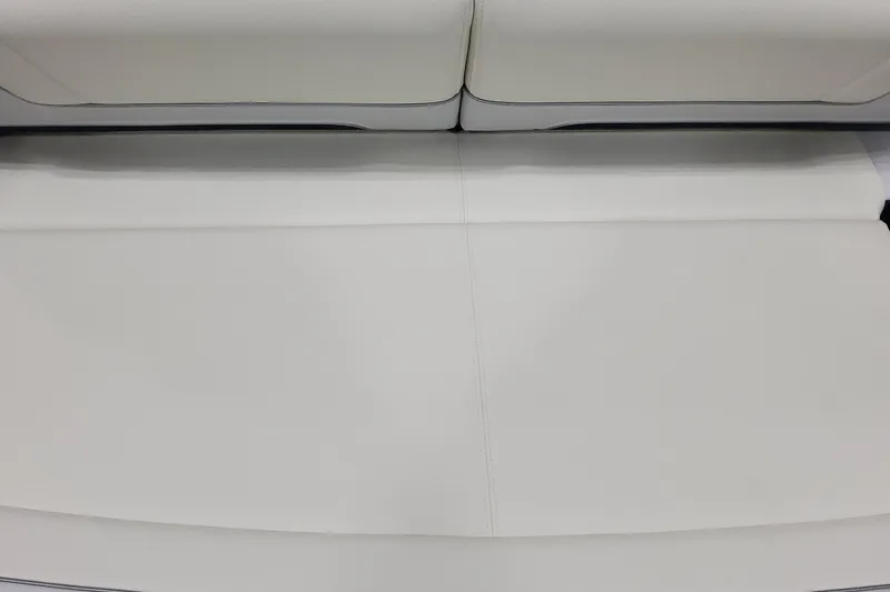 Slide: The Image of 2026 Formula 330 Crossover Bowrider OB, white leather seating detail. - 21