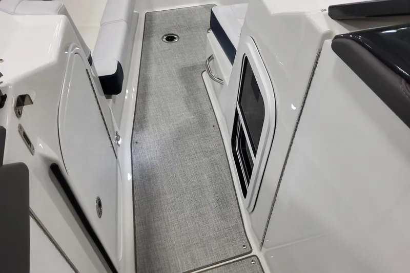 Slide: The Image of 2026 Formula 330 Crossover Bowrider OB interior, featuring sleek seating and modern flooring. - 36