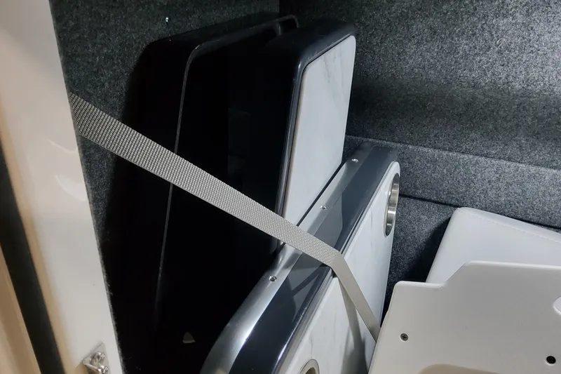 Slide: The Image of Interior storage of 2026 Formula 330 Crossover Bowrider OB with secured panels. - 40