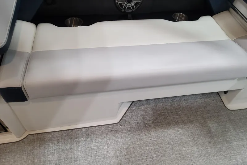 Slide: The Image of 2026 Formula 330 Crossover Bowrider OB interior seating with cup holders and speaker. - 48