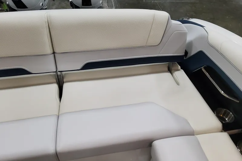 Slide: The Image of 2026 Formula 330 Crossover Bowrider OB interior seating, featuring luxurious white upholstery. - 61