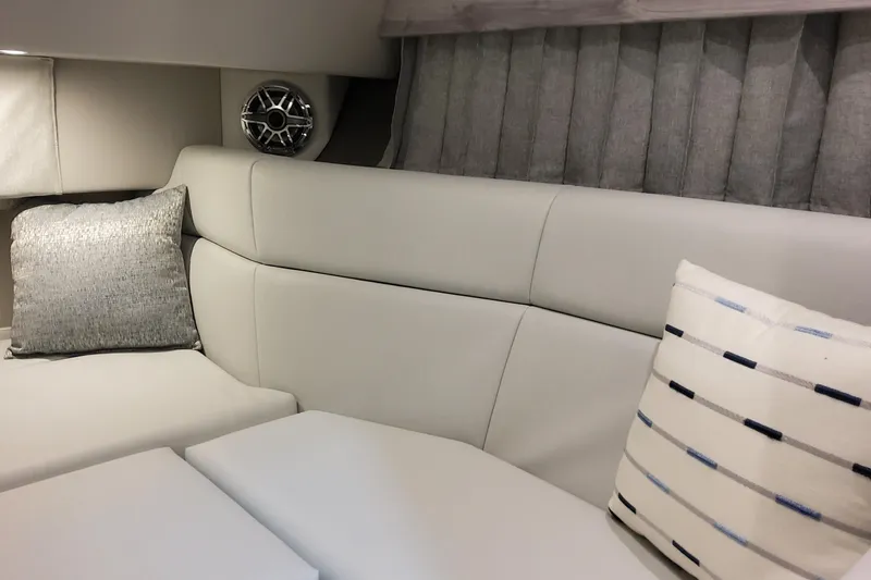 Slide: The Image of Luxurious interior of 2026 Formula 330 Crossover Bowrider OB with plush seating and cushions. - 75
