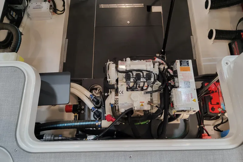 Slide: The Image of Engine compartment of 2026 Formula 330 Crossover Bowrider OB, showcasing detailed mechanical components. - 86