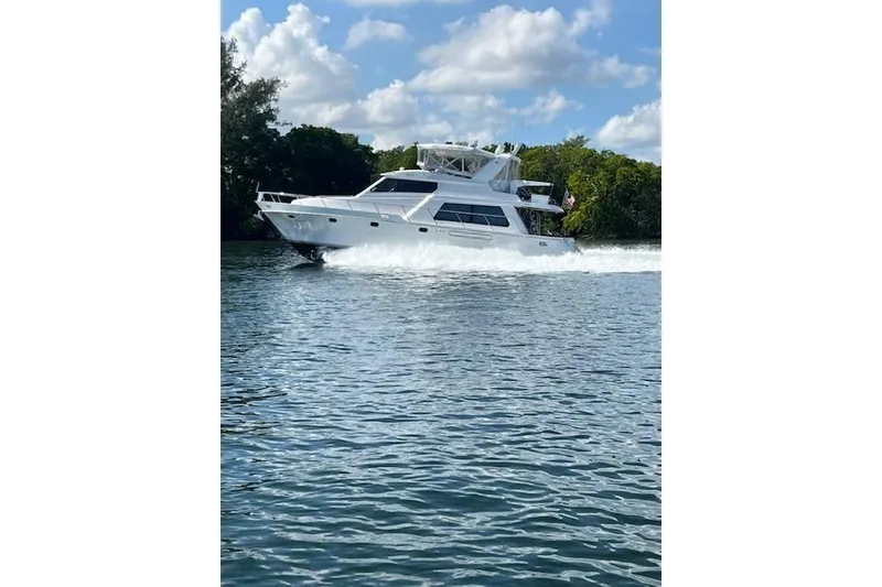 Slide: The Image of 2007 Pama 540 LX Pilothouse yacht cruising on a sunny day. - 12