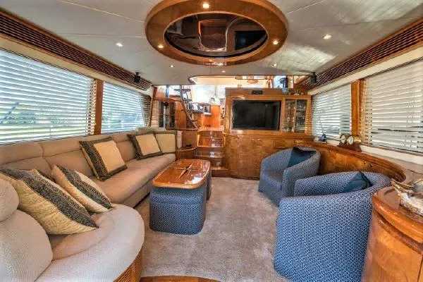Slide: The Image of Luxurious interior of 2007 Pama 540 LX Pilothouse yacht with plush seating and elegant decor. - 28
