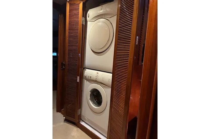 Slide: The Image of Stacked washer and dryer in 2007 Pama 540 LX Pilothouse yacht interior. - 32