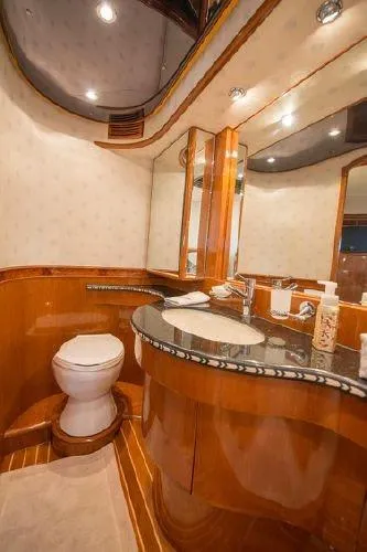Slide: The Image of Luxurious bathroom in 2007 Pama 540 LX Pilothouse yacht with elegant wood finishes. - 34