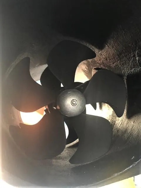 Slide: The Image of Close-up of a 2007 Pama 540 LX Pilothouse propeller in a dark tunnel. - 47