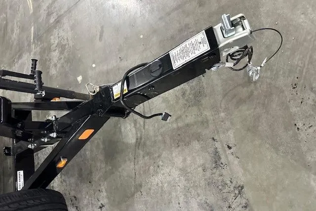 Slide: The Image of Trailer hitch for 2024 Crownline 240 SS boat on concrete floor. - 4