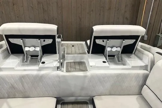 Slide: The Image of 2024 Crownline 240 SS boat interior with adjustable seating and modern design. - 5
