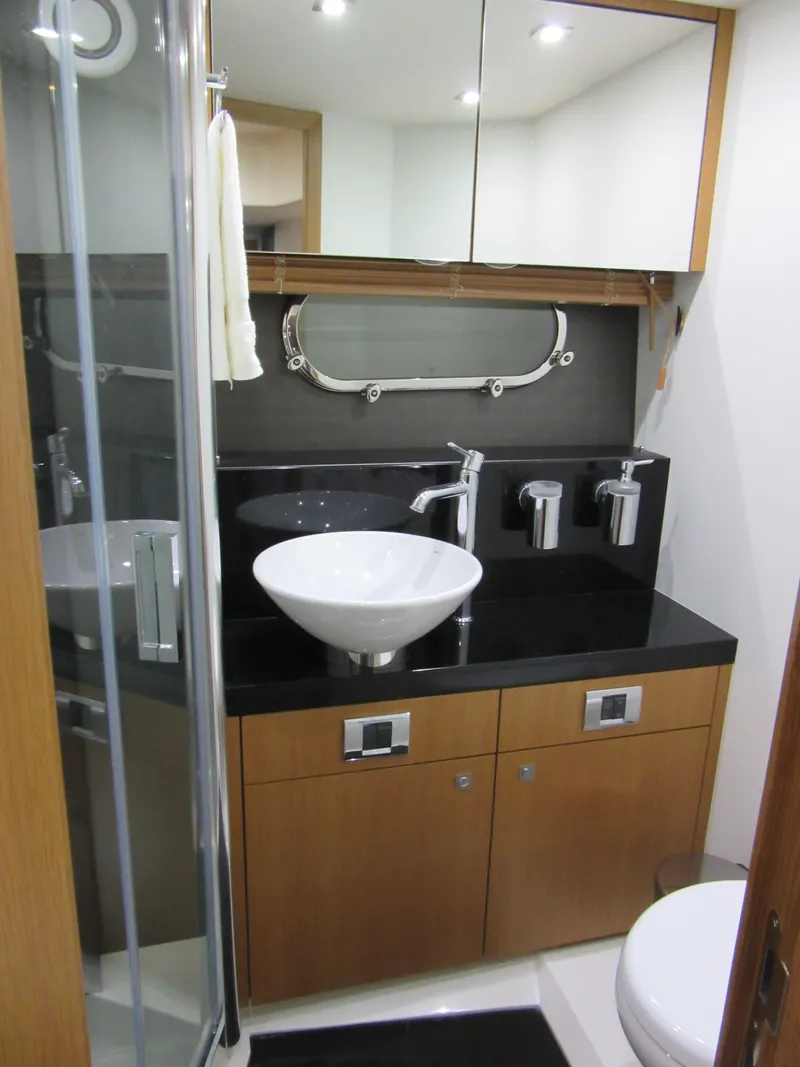 Slide: The Image of Luxurious bathroom in 2014 Sunseeker Manhattan 53 yacht with modern fixtures and sleek design. - 22