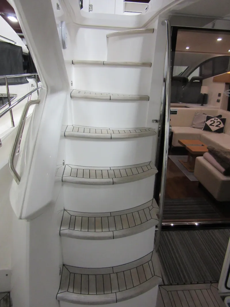 Slide: The Image of Staircase on 2014 Sunseeker Manhattan 53 yacht leading to interior lounge area. - 4