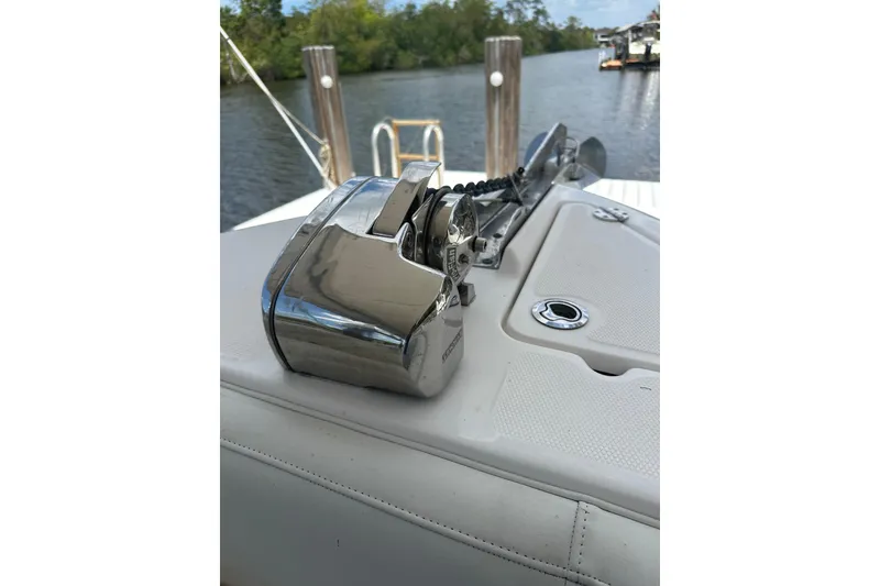 Slide: The Image of 2015 Everglades 295 Center Console boat with anchor winch on deck. - 36