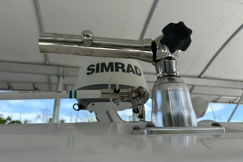 Slide: The Image of Close-up of Everglades 295 Center Console 2015 boat equipment with Simrad radar. - 46