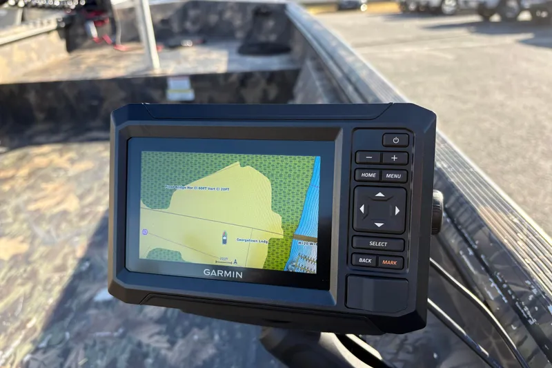 Slide: The Image of Garmin GPS on 2022 Crestliner 1546 Retriever boat, displaying a detailed navigation map. - 17