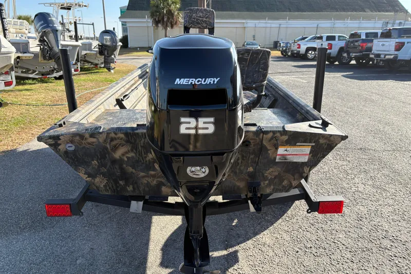 Slide: The Image of 2022 Crestliner 1546 Retriever boat with Mercury 25 outboard motor, parked outdoors. - 8