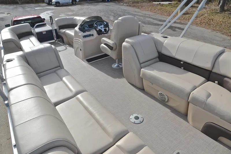 Slide: The Image of 2019 Sun Tracker Party Barge 22 XP3 interior with spacious seating and steering console. - 24