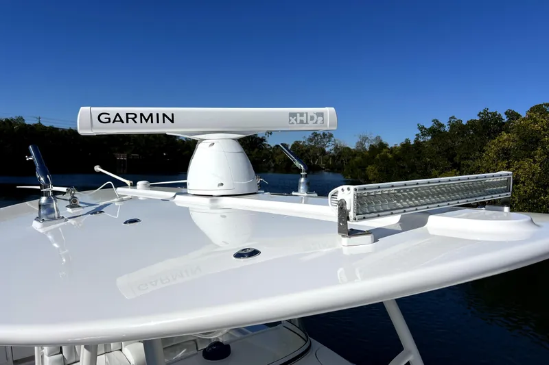 Slide: The Image of 2018 Regulator 34 Center Console with Garmin radar and LED light bar on roof. - 19