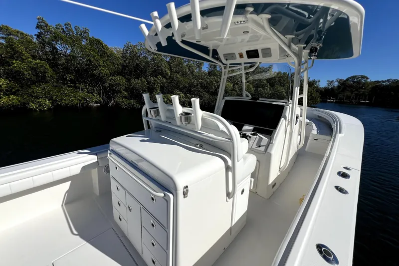 Slide: The Image of 2018 Regulator 34 Center Console boat with sleek design and spacious deck. - 27