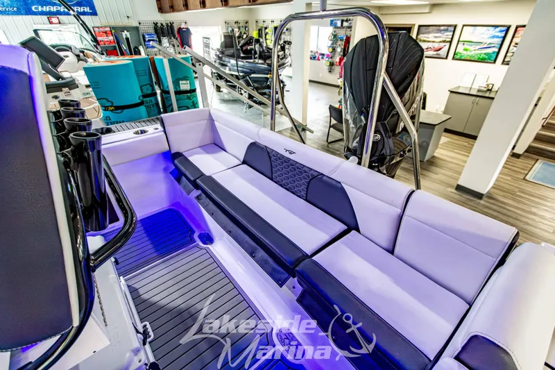 Slide: The Image of 2026 Tidewater 232 LXF boat interior with seating and storage at Lakeside Marina. - 11