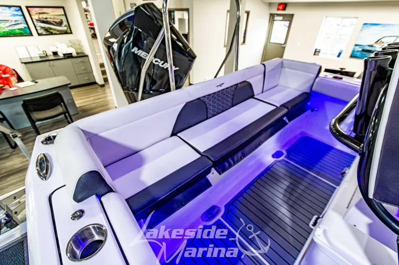 Slide: The Image of 2026 Tidewater 232 LXF boat interior with sleek seating and modern design at Lakeside Marina. - 12