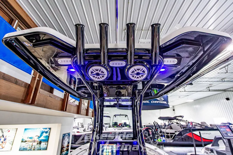 Slide: The Image of 2026 Tidewater 232 LXF boat interior with blue lighting at Lakeside Marina. - 20