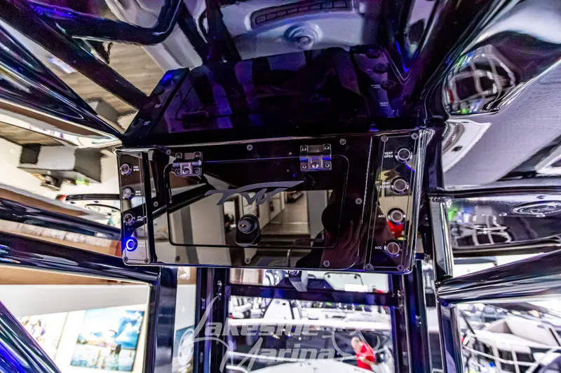Slide: The Image of 2026 Tidewater 232 LXF boat interior at Lakeside Marina showroom. - 28