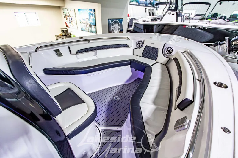 Slide: The Image of 2026 Tidewater 232 LXF boat interior with sleek seating and modern design. - 36