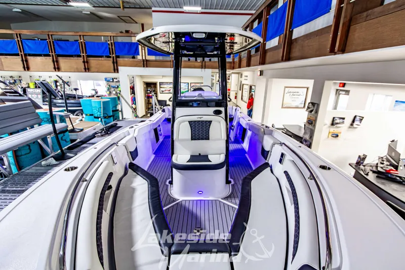 Slide: The Image of 2026 Tidewater 232 LXF boat interior with luxurious seating and modern design. - 37
