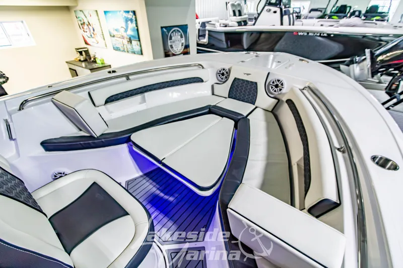 Slide: The Image of 2026 Tidewater 232 LXF boat interior with luxurious seating and modern design. - 41