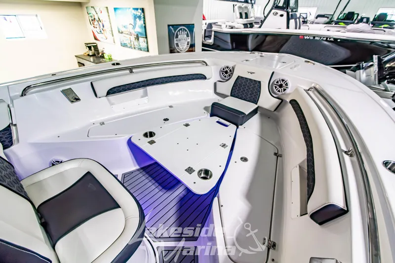 Slide: The Image of 2026 Tidewater 232 LXF boat interior with stylish seating and modern design. - 43