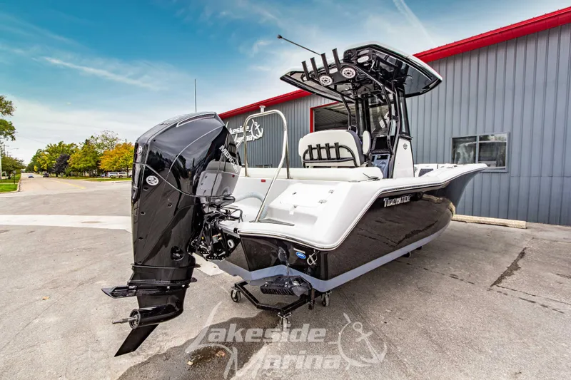 Slide: The Image of 2026 Tidewater 232 LXF boat with powerful outboard motor at Lakeside Marina. - 55