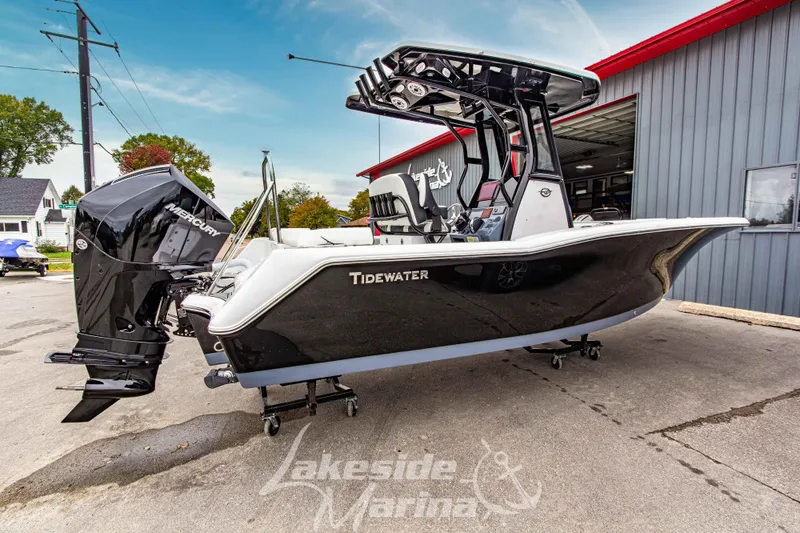 Slide: The Image of 2026 Tidewater 232 LXF boat with outboard motor at Lakeside Marina. - 56