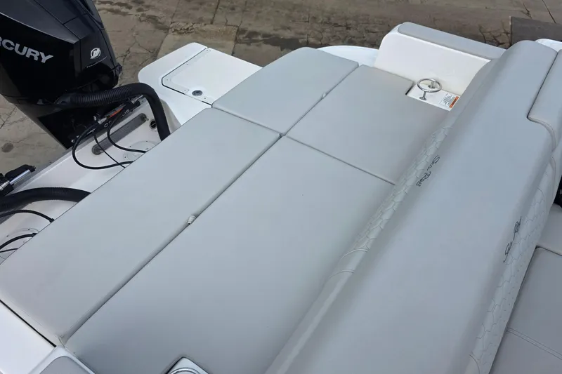 Slide: The Image of 2021 Sea Ray SDX 290 Outboard boat with Mercury engine and spacious seating area. - 20