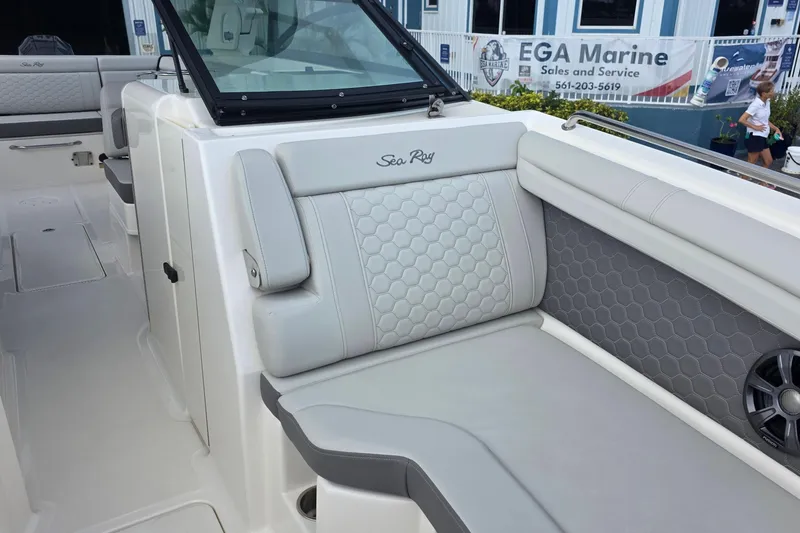 Slide: The Image of 2021 Sea Ray SDX 290 Outboard boat interior with luxurious seating and modern design. - 32