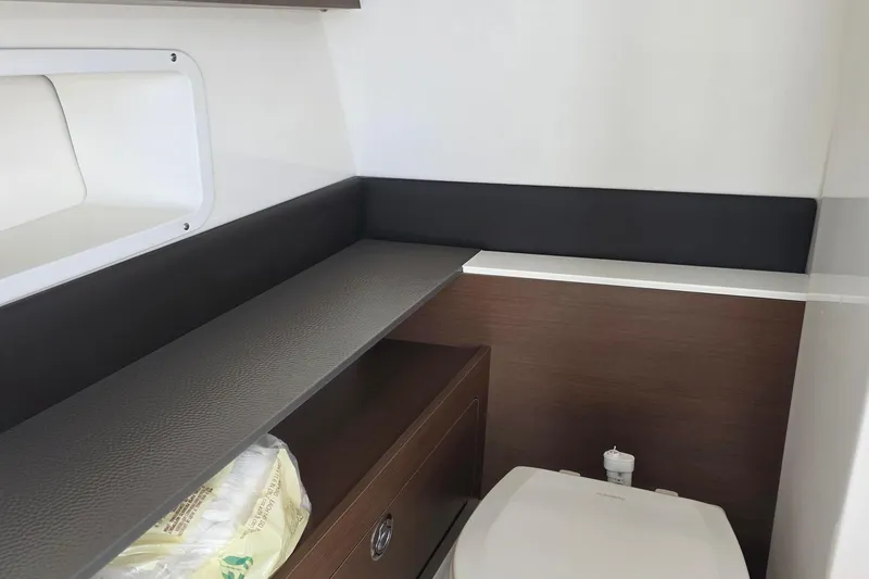 Slide: The Image of 2021 Sea Ray SDX 290 Outboard interior with modern bathroom design. - 34