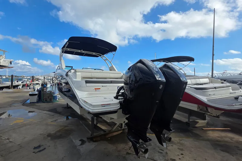 Slide: The Image of 2021 Sea Ray SDX 290 Outboard boat with twin engines at marina dock. - 37