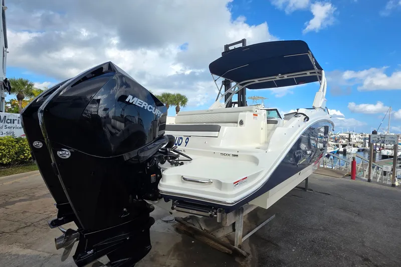 Slide: The Image of 2021 Sea Ray SDX 290 Outboard boat with Mercury engine at marina. - 38