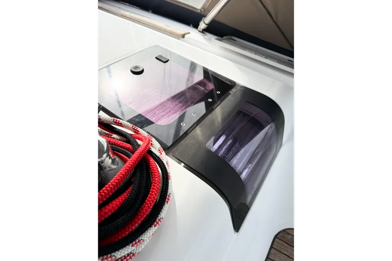 Slide: The Image of Deck of 2013 Jeanneau Sun Odyssey 409 with ropes and hatch. - 28
