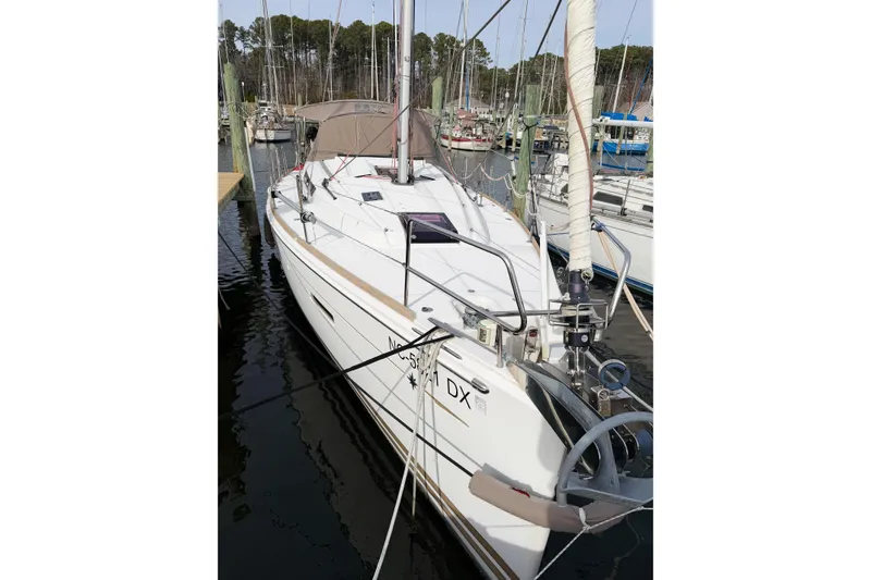 Slide: The Image of 2013 Jeanneau Sun Odyssey 409 sailboat docked at marina. - 3