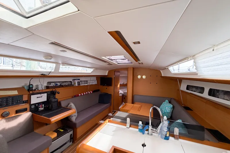 Slide: The Image of Interior of 2013 Jeanneau Sun Odyssey 409 sailboat, featuring modern design and comfortable seating. - 43