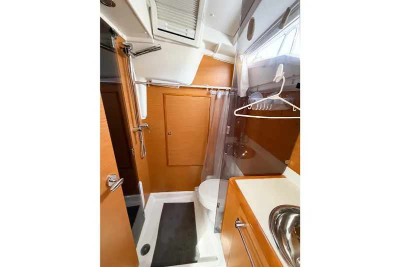 Slide: The Image of Interior of 2013 Jeanneau Sun Odyssey 409 yacht bathroom with shower and sink. - 63